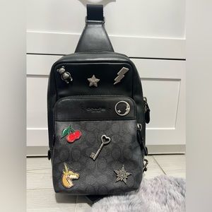 Coach Gotham Leather and Coated Canvas logo sling backpack